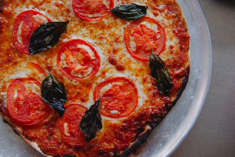 luce pizza prosciutto arugula pie